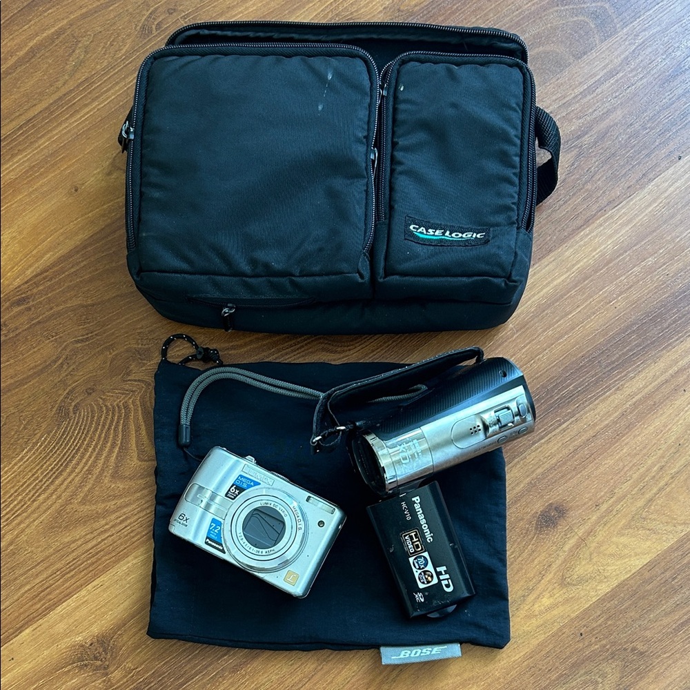 Panasonic Luminex Digital Camera and Panasonic video camera with boss bag and